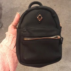 💰 black backpack *only $5 with purchase!*